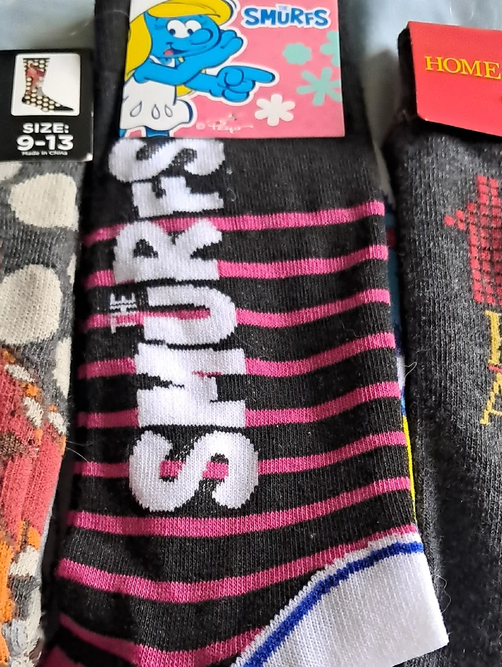 Disney, smurf and home alone socks